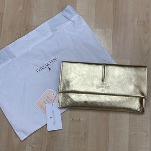 Patricia Pepe gold clutch with cross body chain